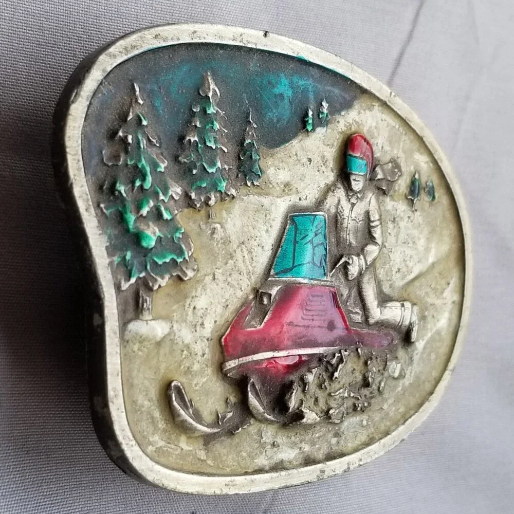 Vintage Belt Buckle 1977 Snowmobile Riding On Snow‎ Colorized USA By Bergamot